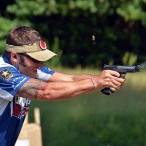 John Scoutten using Hearing Protection while Shooting